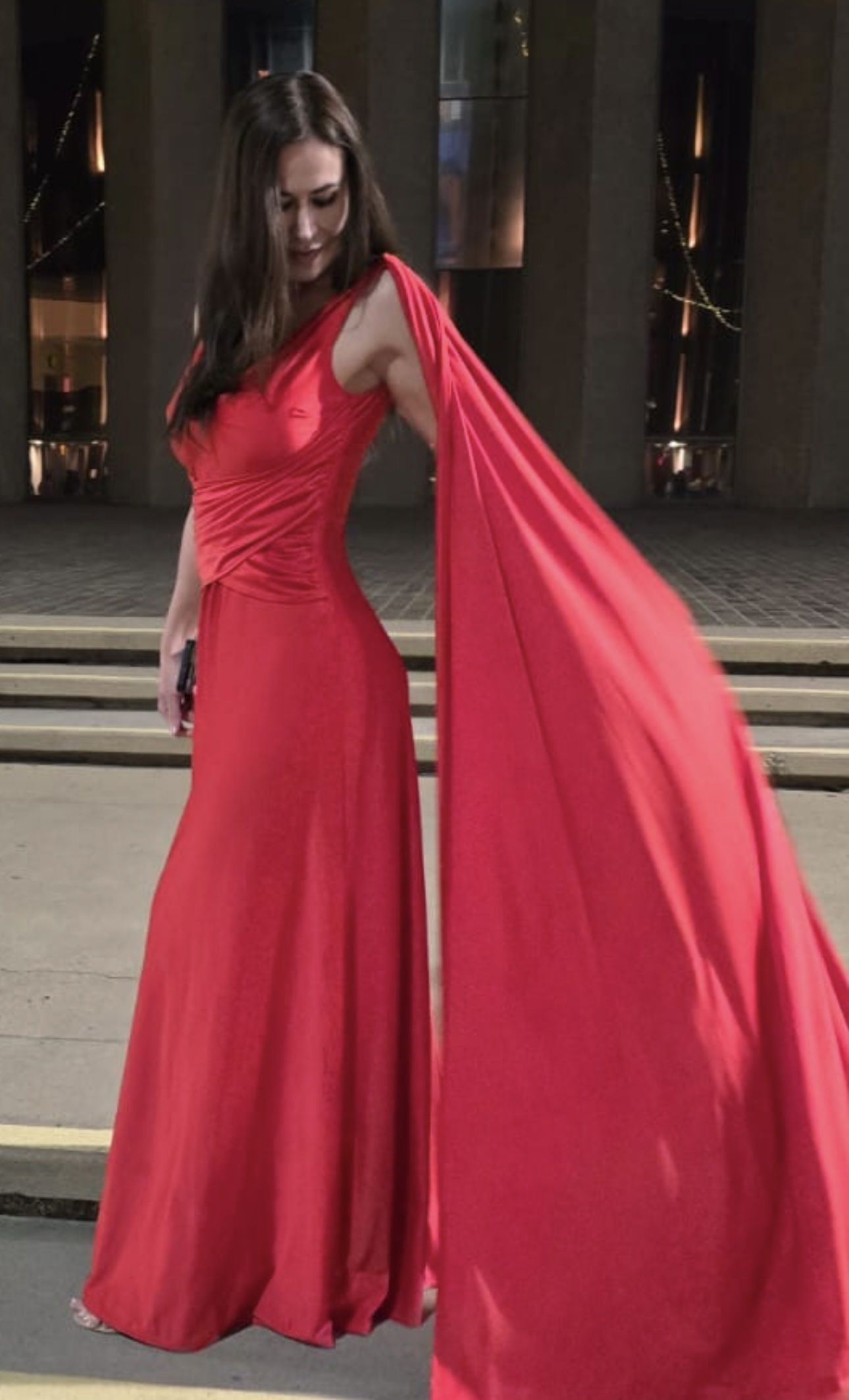 Red gown with a flowing cape train